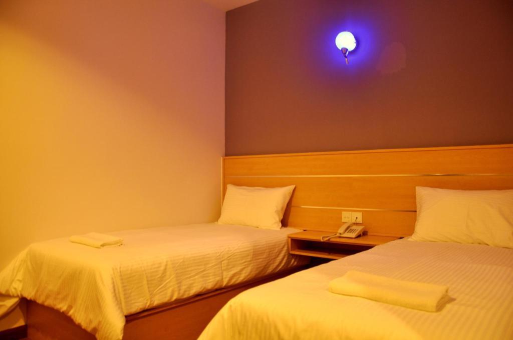 Hotel Economy Kapar Pokoj fotografie